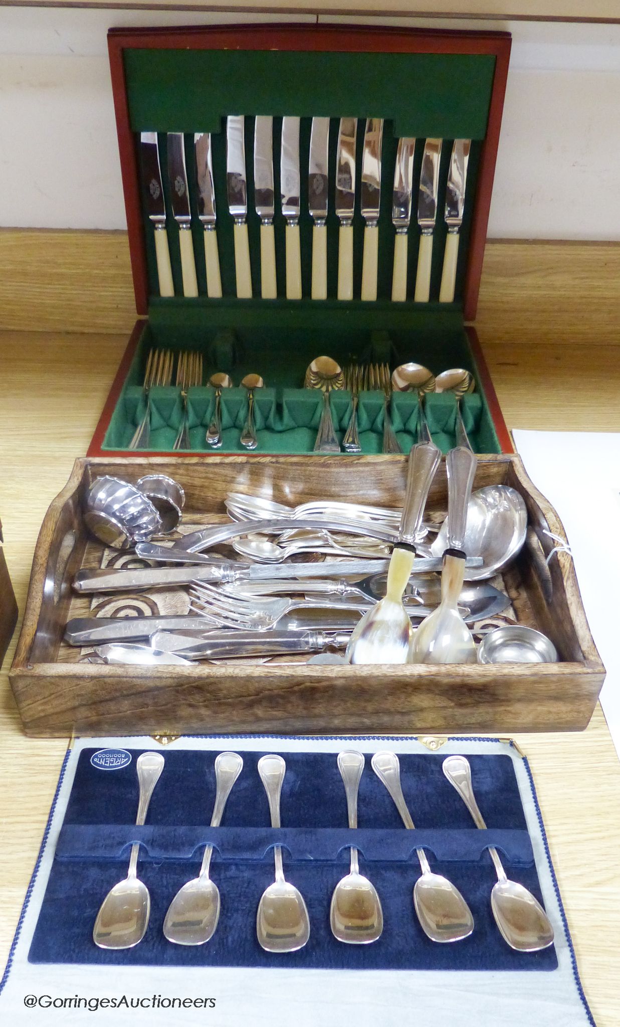 Five Italian 800 standard tea spoons, and six dessert spoons, a silver napkin ring, an 800 standard pill box and a quantity of plated cutlery.